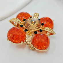 Load image into Gallery viewer, Elegant Vintage Imitate Amber Flower Brooch Orange Cross-Shaped Floral Jewelry
