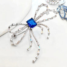 Load image into Gallery viewer, Bow-Shaped Brooch with Royal Blue Square Center Stone – Elegant and Lively Design for Women
