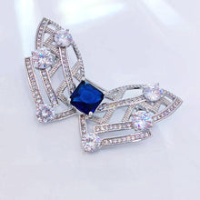 Load image into Gallery viewer, Modern Art-Inspired Butterfly Geometric Brooch Pins with Blue Stone – Silver-White Bow Design
