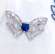 Load image into Gallery viewer, Modern Art-Inspired Butterfly Geometric Brooch Pins with Blue Stone – Silver-White Bow Design
