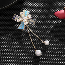 Load image into Gallery viewer, Jewelblings Designer Gold Tone Two Layered Cross Domed Windmill Brooch Pin with Pearl Drop
