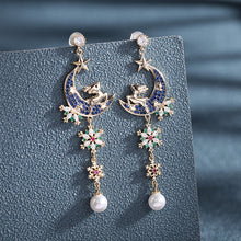 Load image into Gallery viewer, Jewelblings Fair Tale Style Long Golden Reindeer Blue Moon Snowflake Pearl Drop Earrings
